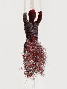 Protest (2010), Laser Prints on Card, Red Ink, Bonded Nylon and Seed Beads, Edition of 3, H180 x W60 x D60cm