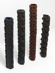Totems (2010), Laser-Cut MDF, Acrylic, Ink, Strass Crystals, Ostrich and Peacock Feathers, Varnish, Unique, Red: 135cm, Green: 128cm, Blue: 116cm, Black: 109cm